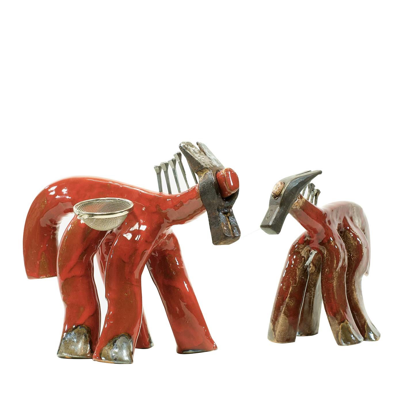Tatillo e Pizzicato Asini Sculture rosse